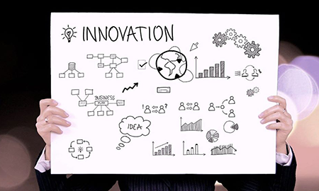 Grafika ozdobna przedstawiająca plansze z wykresami wzorami duży napis innovation
